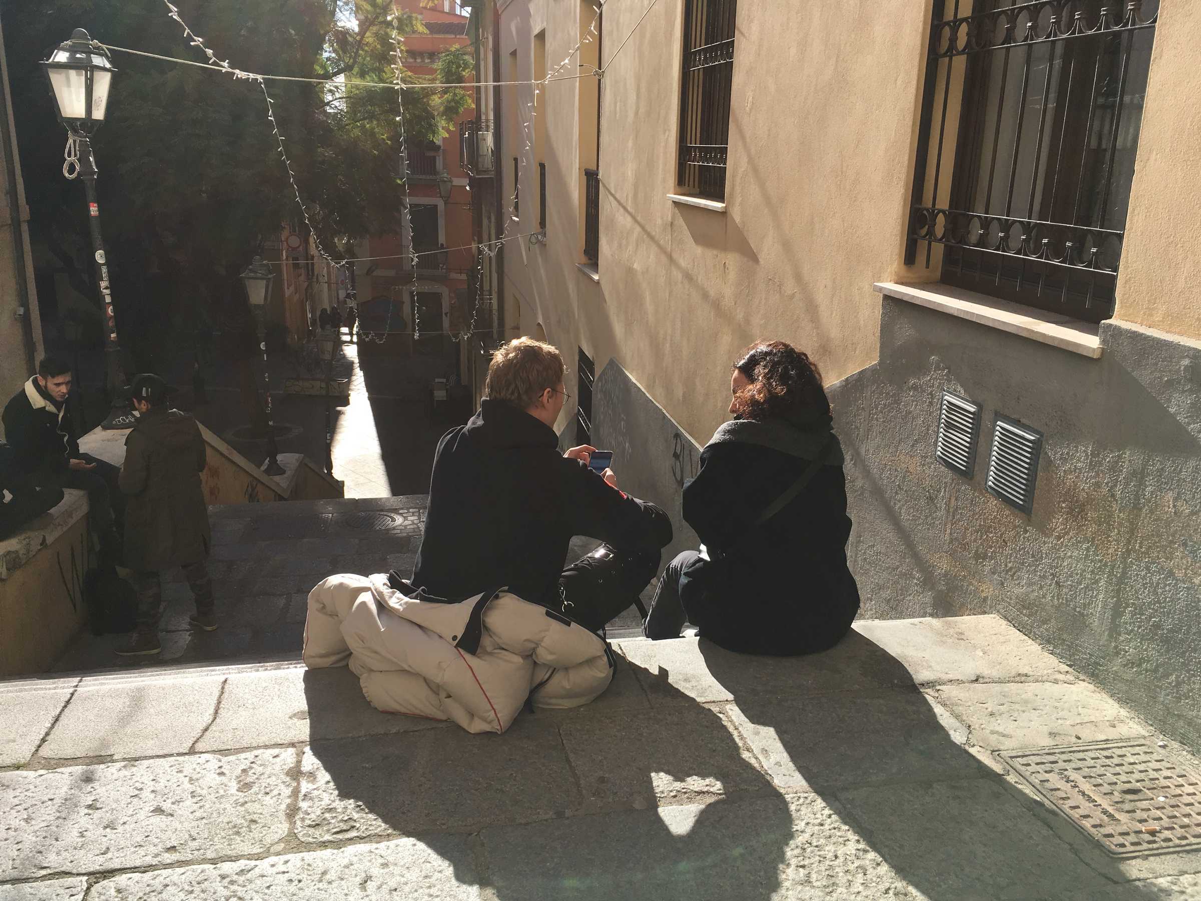 How To Do things With Theory ~ face to face meeting Ghalya Saadawi and Nilz Källgren, in the streets of Cagliari. DAI week 4, January 2019. Photo: Jacq van der Spek.