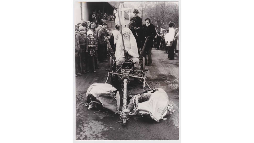 Remembering The Plague: Two Moribund Lay on the Ground in front of Death. Carnival of Postrekov, in the Chodsko Region in South-west Bohemia. Keystone Press Agency, February 25, 1977. Courtesy of the artist.