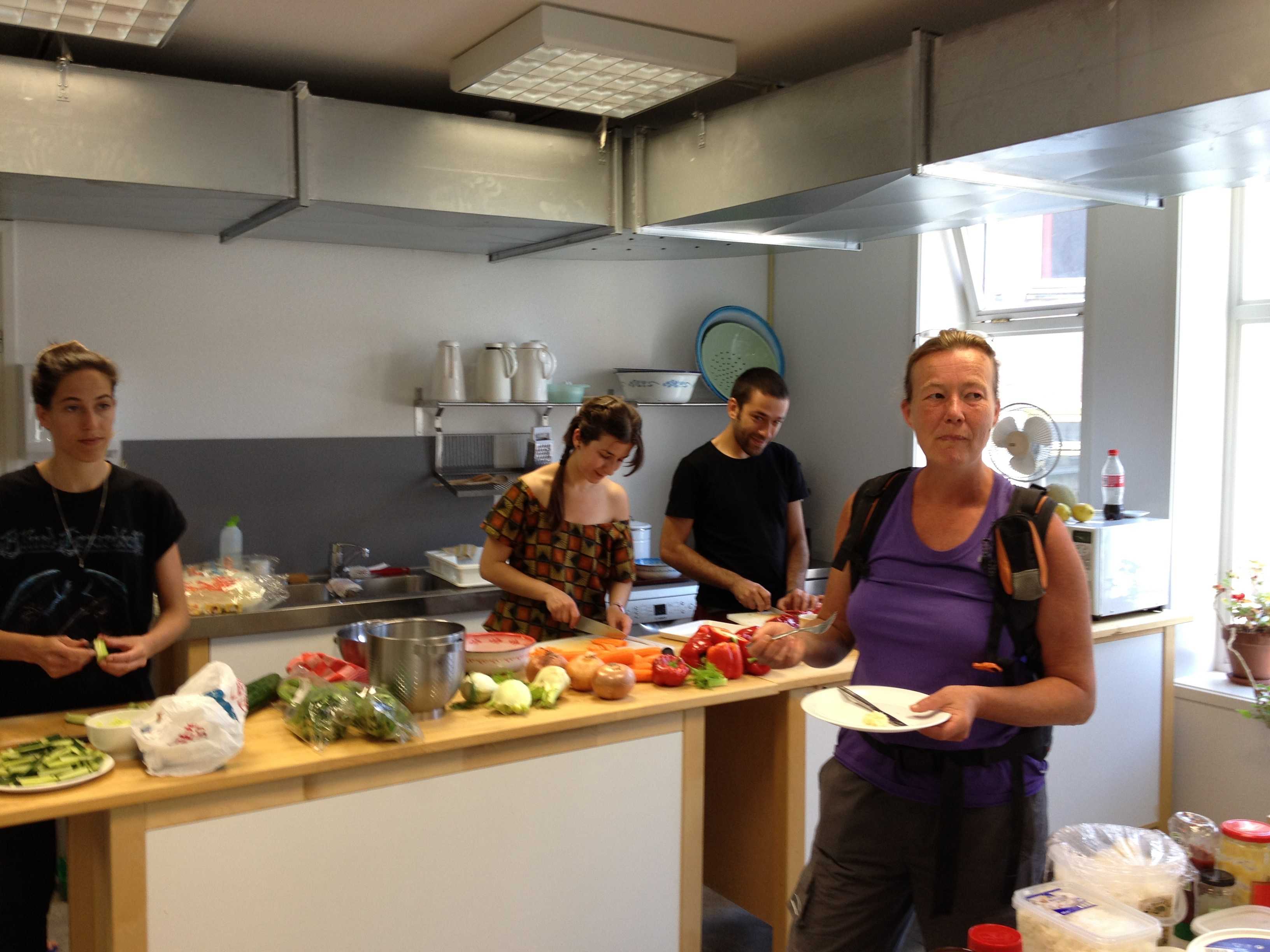 July 2012: Amarasraddha in the DAI's cantina together with students Mercedes, Isabel and Pendar ( cutting vegetables).