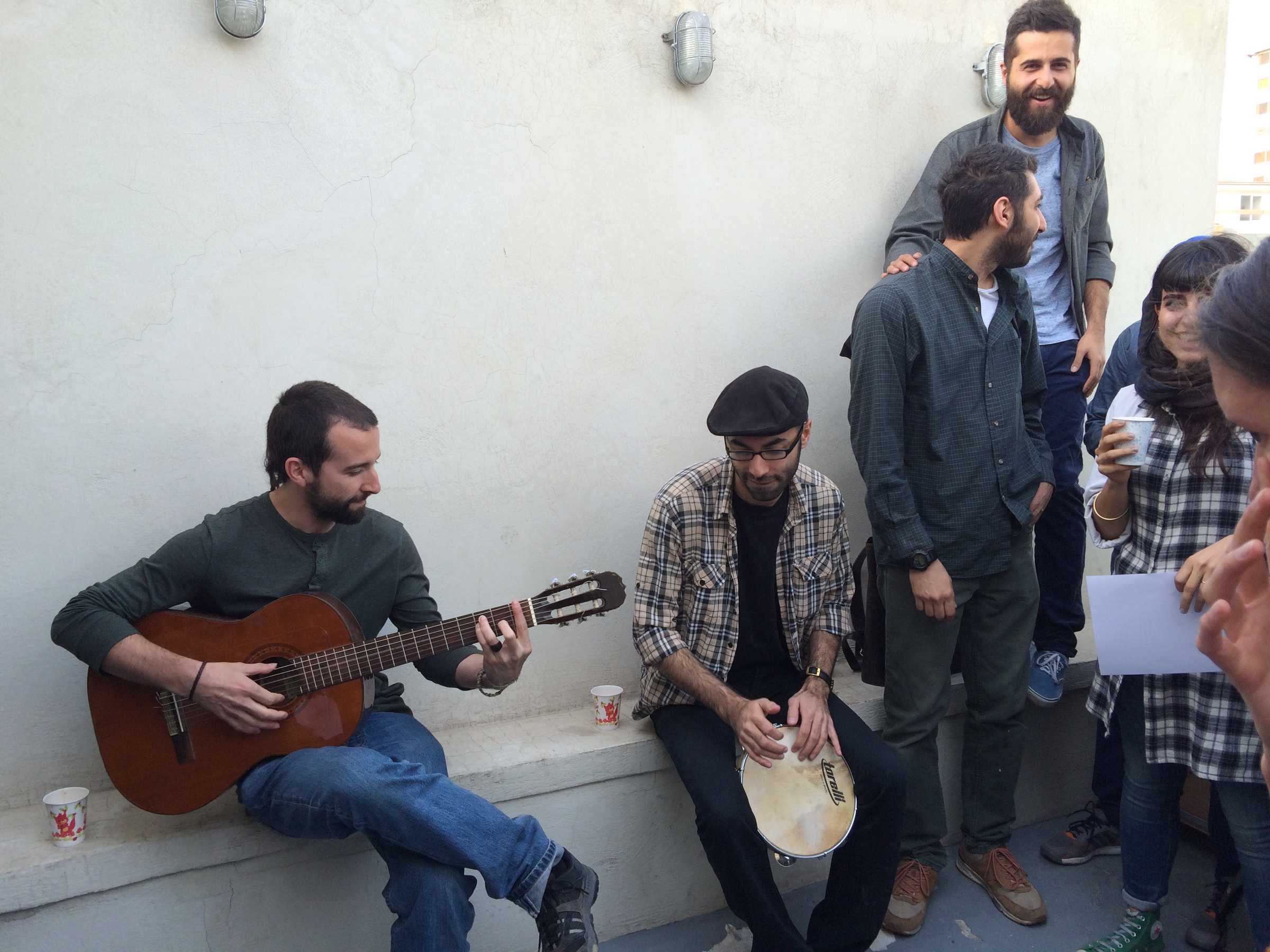 Miguel Angel Rego Robles, playing the guitar in Teheran, during DAI's Roaming Academy 2015.