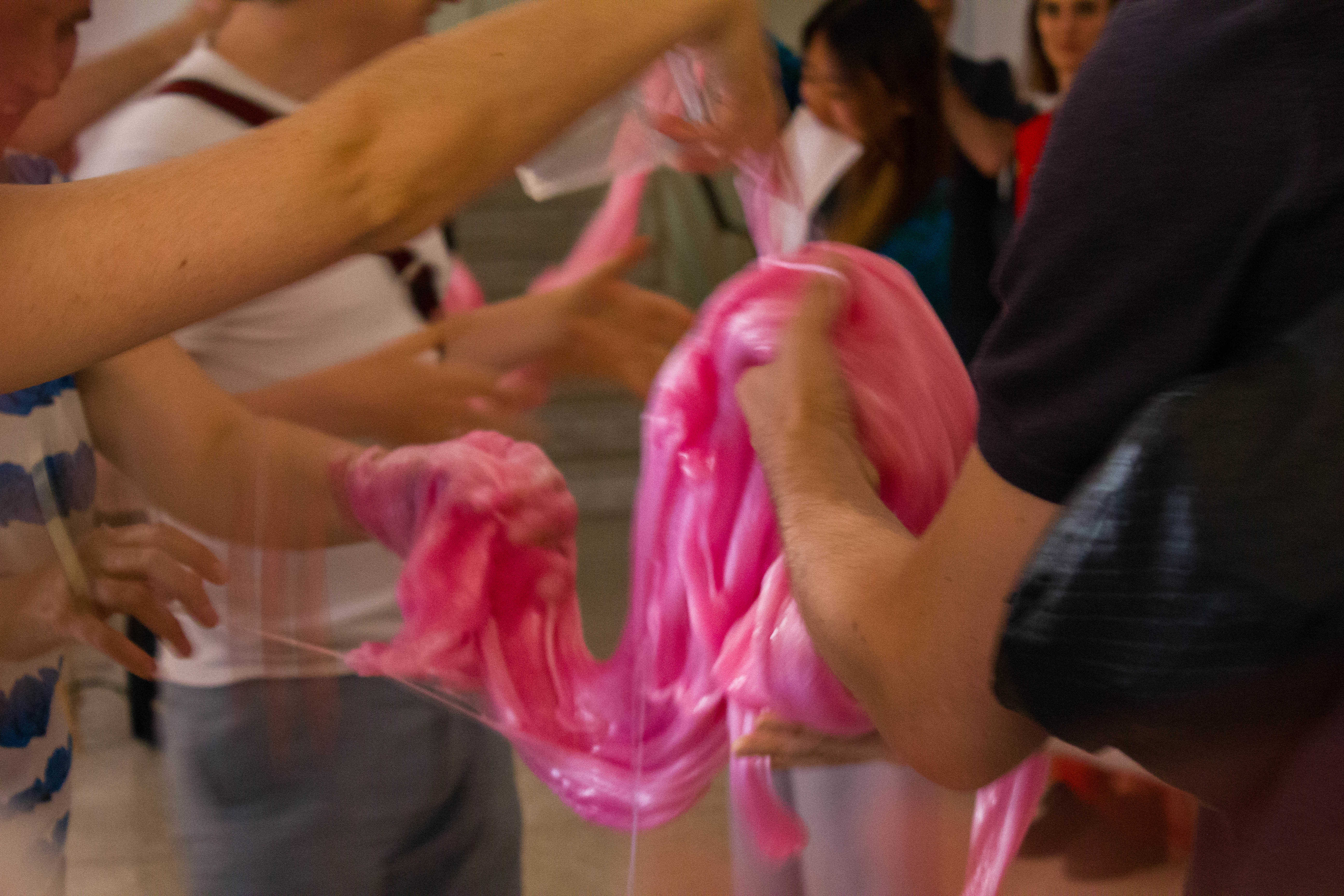 COOP SUMMIT 2018: the Topologies of Touch study group poured a waterfall of pink gooey substance from the second floor ( Anja Khersonska: The Pink Goo Manifesto) of Circuits & Currents Project Space of the Athens School of Fine Arts, June 1,  2018. Photo: Silvia Ulloa for DAI Roaming Academy.