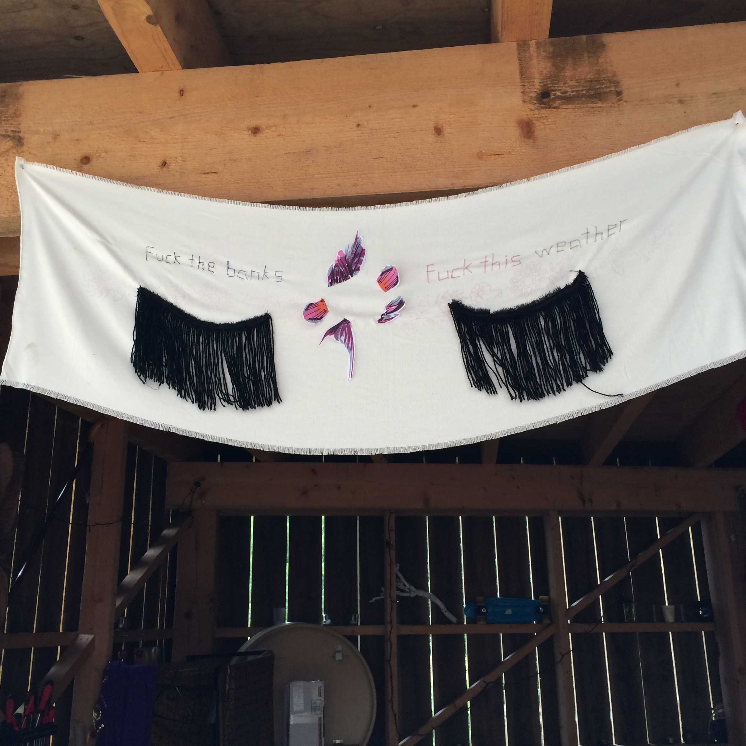 larose (DAI, 2017): Fuck the Bank 5 / Fuck this Weather ~ textile banner attached to the ceiling of the barn at the DAI-camp @ SONSBEEK 2016 in Arnhem.