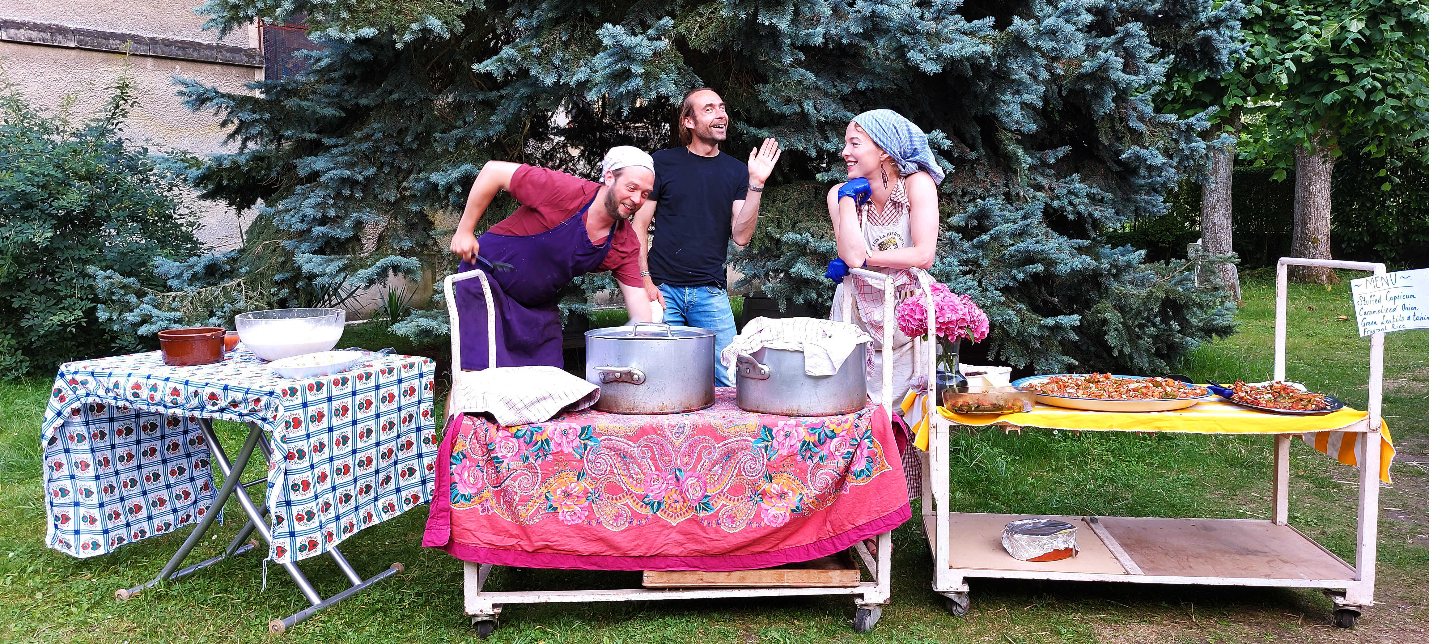 Our chefs for the week - Veniamin (Axe & Porridge), Daniel & Vera serving us exceptional dinner in the garden. PAF, July 2021. Photo credits: Nikos Doulos