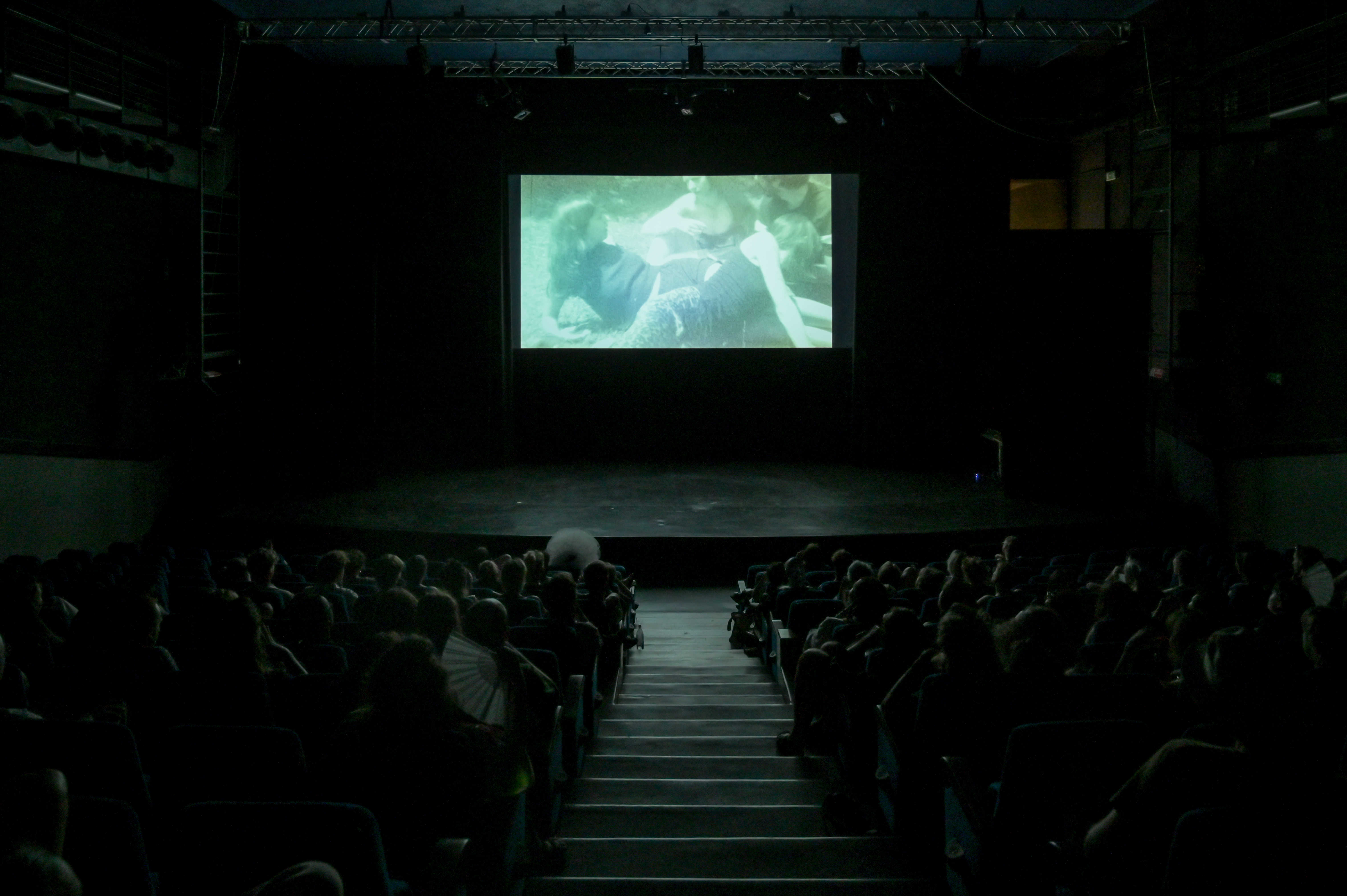 reprise, revise: (re)frame ~ a COOP SUMMIT 2022 performative screening curated and produced by the COOP study group Curating Positions: Nostalgia for the light*: Struggles’ Reverberations in Cinema. Location: Auditorium di Piazza Libertà in Bergamo.  Photo credit: Baha Görkem Yalim for DAI.  August, 2022.