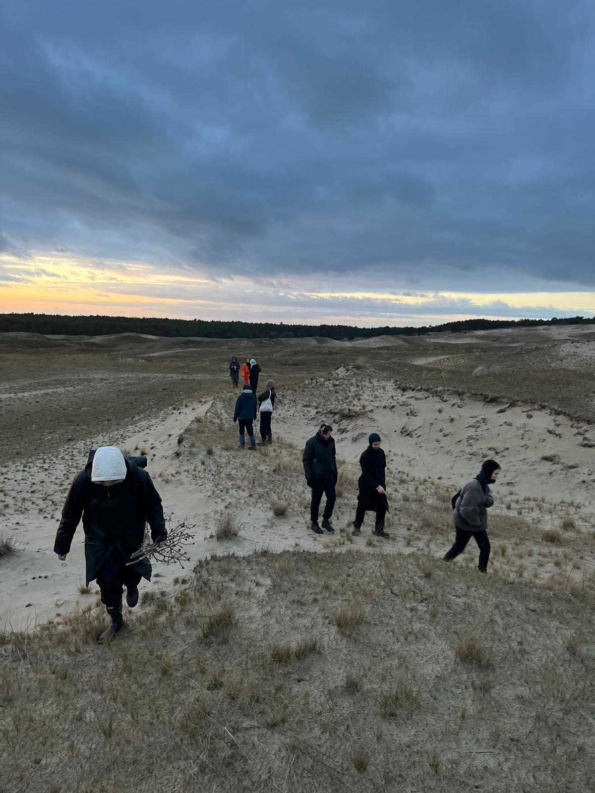 COOP study group – FOREST AS IMAGE AND INFRASTRUCTURE on a walk in the dunes. Nida, January 2023. Photo credit: Jurga Daubaraitė.