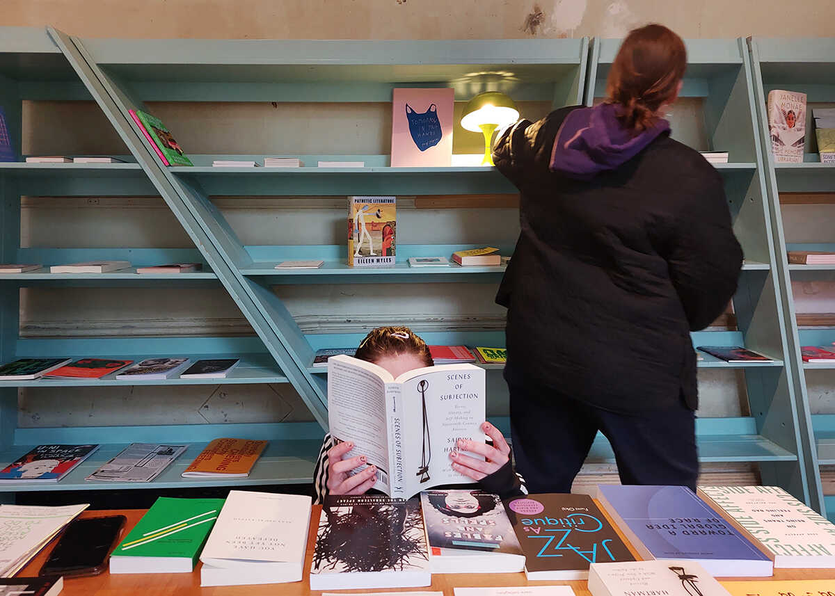 Pop-up of KIOSK artist run bookshop from Rotterdam (run by Flip Driest). Beautifully installed in the DAI bookshelves made by Chris Meighan.  PAF (St.Erme), March 2023. Photo credit: Nikos Doulos.
