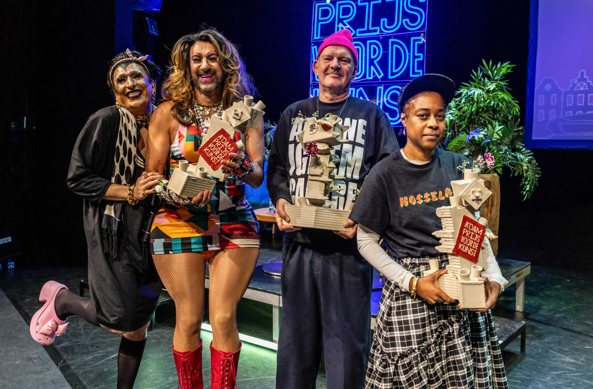 From left to right: The House of Hopelezz and the other two awardees Joost van Bellen en Farida Sedoc. Photo: Eva Plevier.