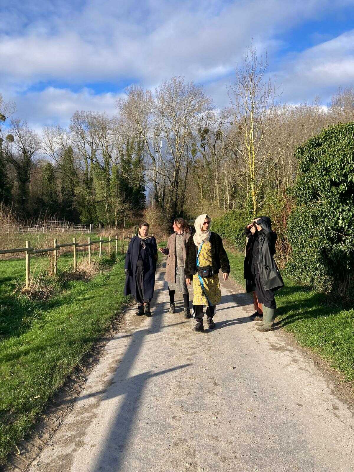 COOP ~ The Word and the Wound. Frédérique Bergholtz on a group walk with participants. PAF (St.Erme), March 2024. Photo credit: Helena Estrela.